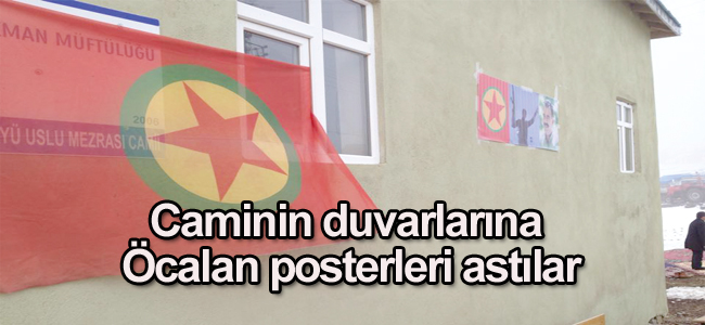 Caminin duvarlarına  Öcalan posterleri astılar