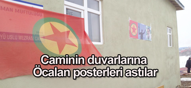 Caminin duvarlarına Öcalan posterleri astılar