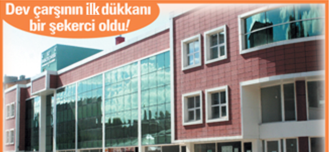 Süt çarşısında  şeker satacak