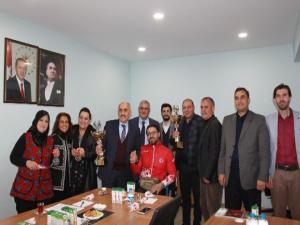 Erzurum Kent Konseyi Milli Sporcu Seven'i altınla ödüllendirdi