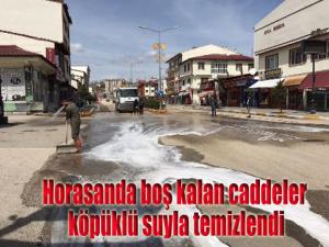 Horasanda boş kalan caddeler köpüklü suyla temizlendi