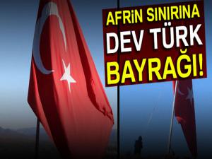 Köylüler Afrin sınırına dev Türk bayrağı astı