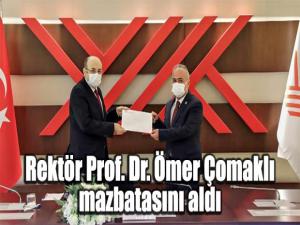 Rektör Prof. Dr. Ömer Çomaklı mazbatasını aldı