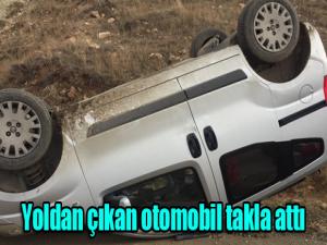 Yoldan çıkan otomobil takla attı