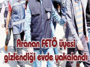 Aranan FETÖ üyesi gizlendiği evde yakalandı