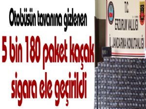 Otobüsün tavanına gizlenen 5 bin 180 paket kaçak sigara ele geçirildi