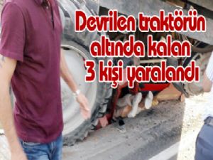 Devrilen traktörün altında kalan 3 kişi yaralandı