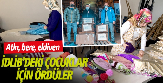 İdlib’deki çocuklara atkı, eldiven ve bere ördüler